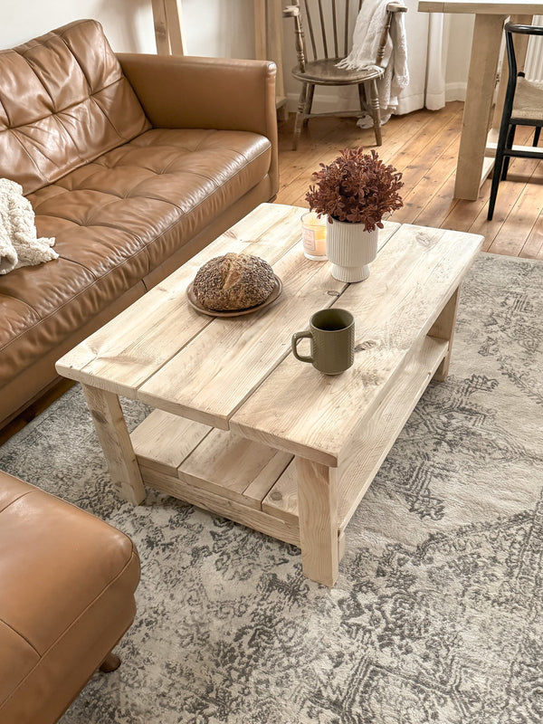 Handmade wooden coffee table in rustic living room