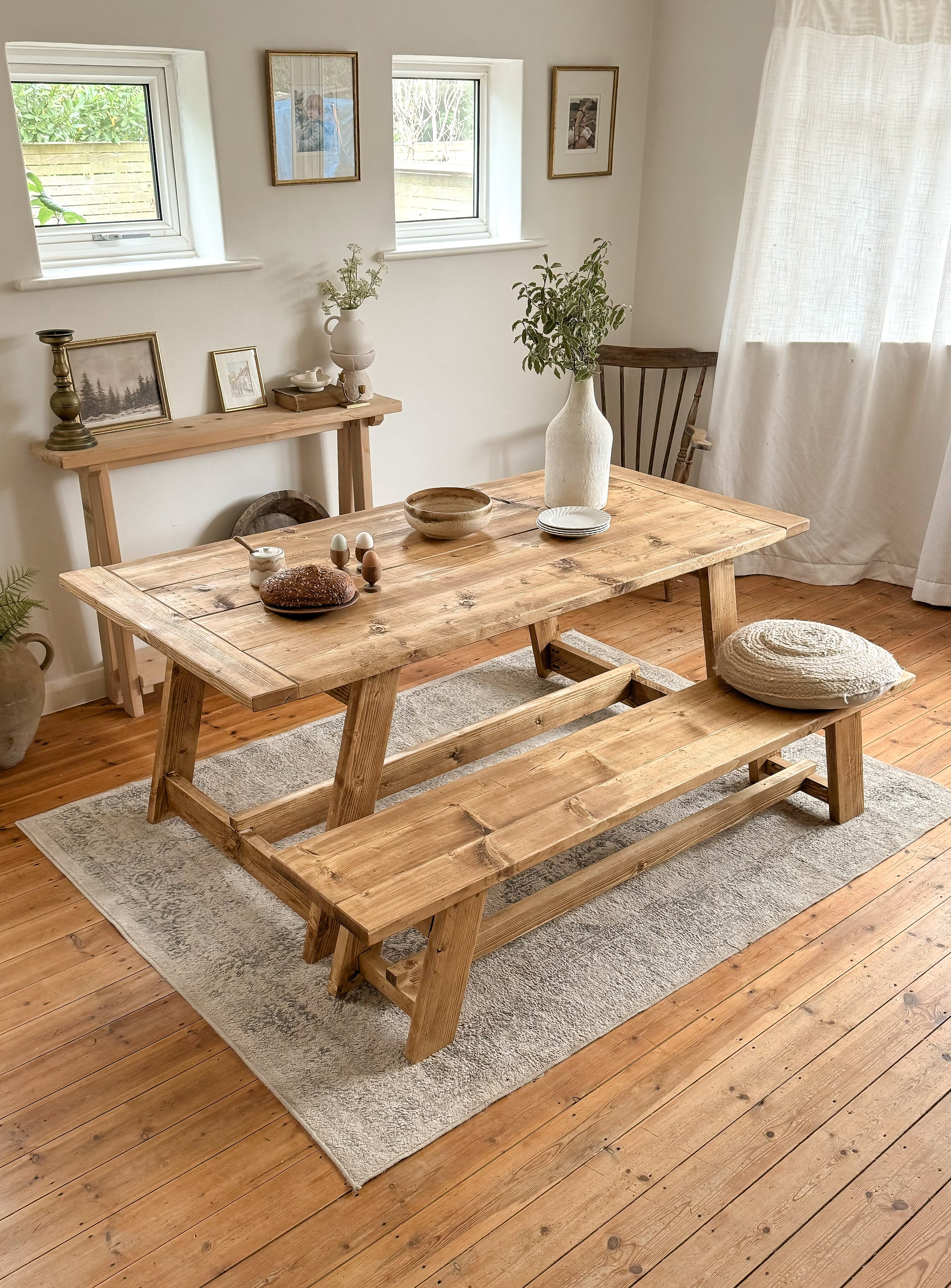 Rustic dining table with matching farmhouse benches