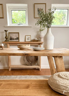 Close up styled version of the Farmhouse table, showing the woodgrain of the table.
