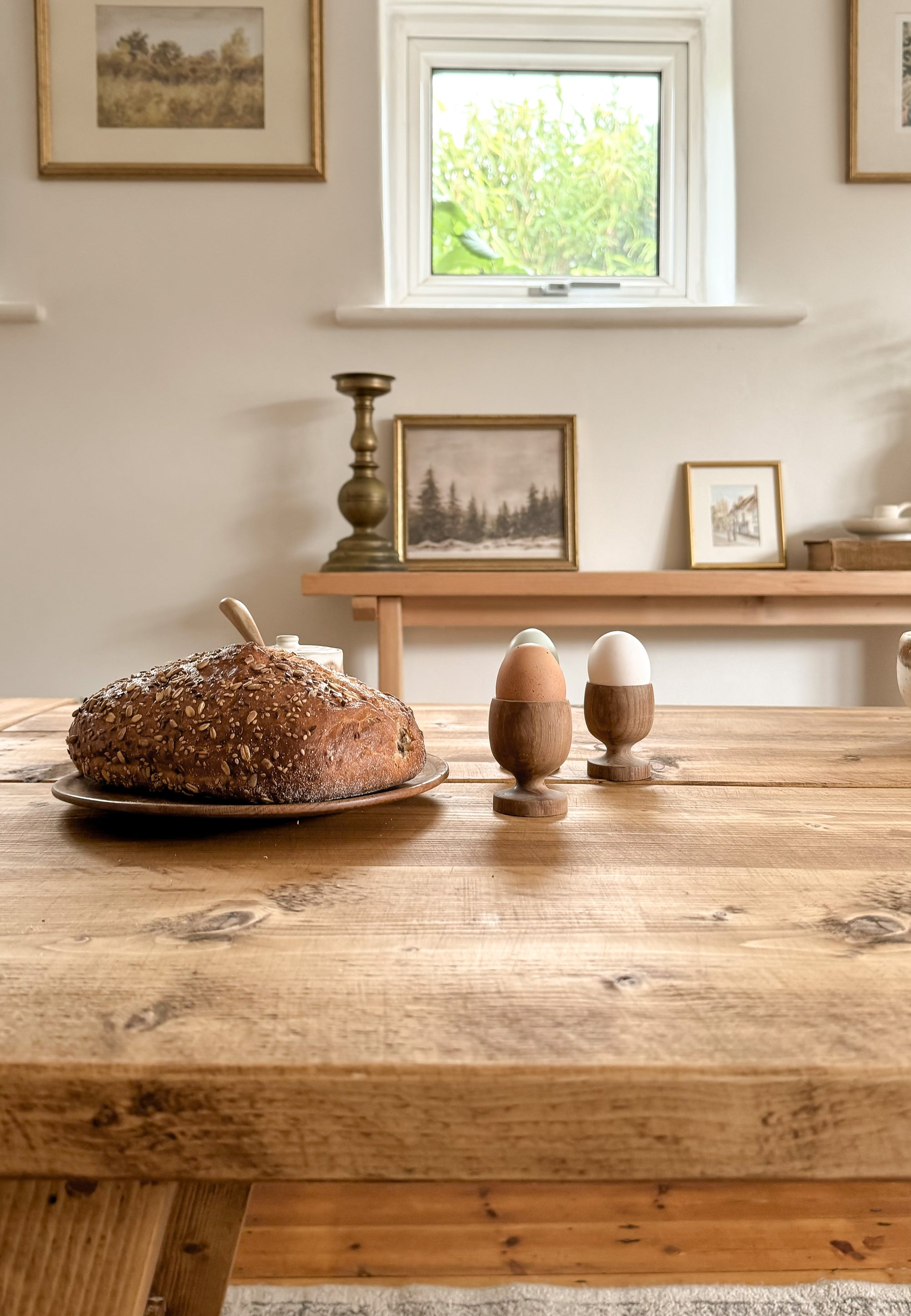 Close up of the rustic dining table wood grain and reclaimed wood character.
