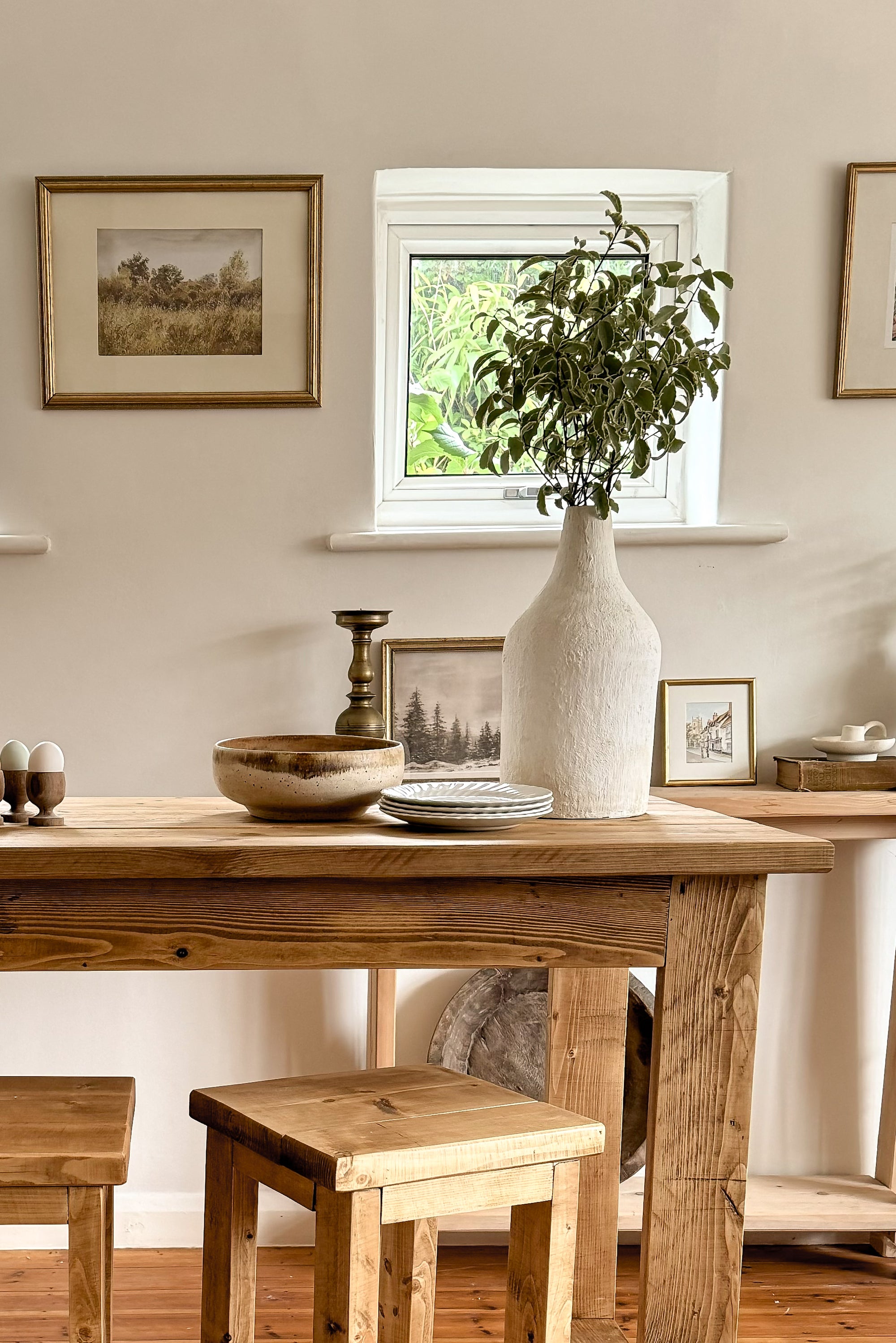 close up of bar table in kitchen with white walls