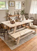 Handmade rustic dining table with matching wooden bench in Natural finish.
