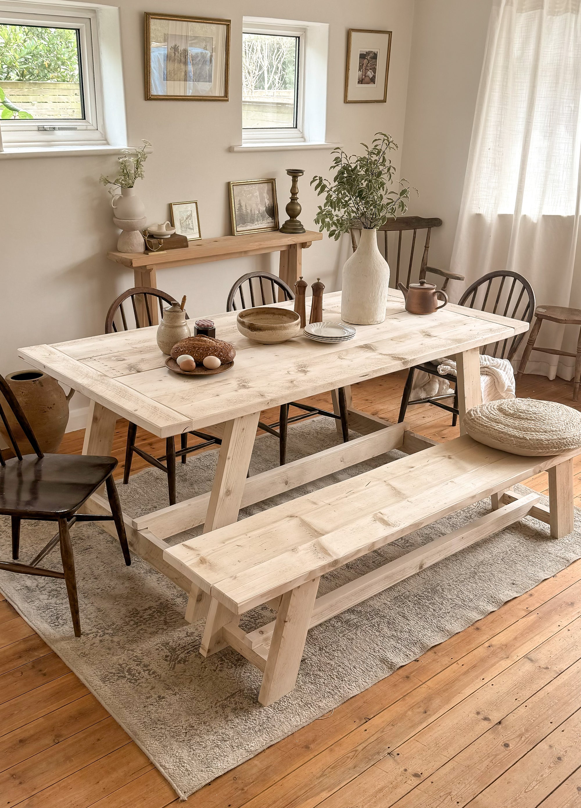 Handmade rustic dining table with matching wooden bench in Natural finish.