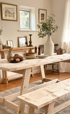 Rustic dining table with bench styled in a family dining room.